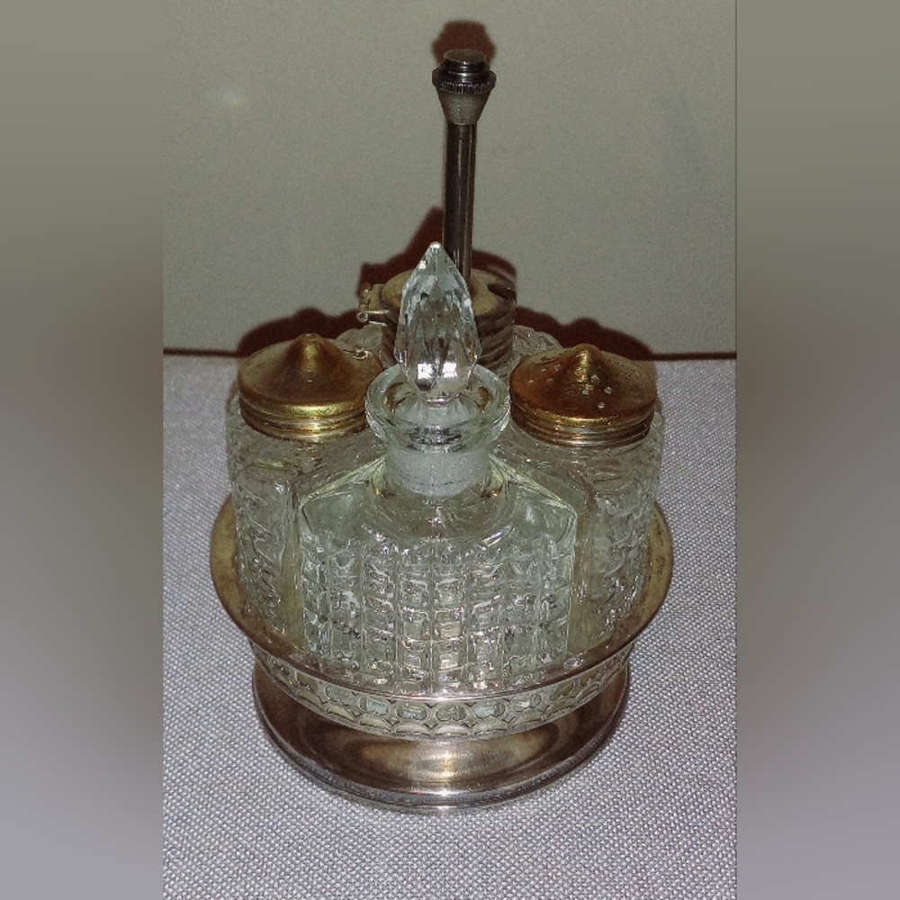 Vtg Silverplated Scrolled Rotating Condiment Caddy Four Glass Jars Set.